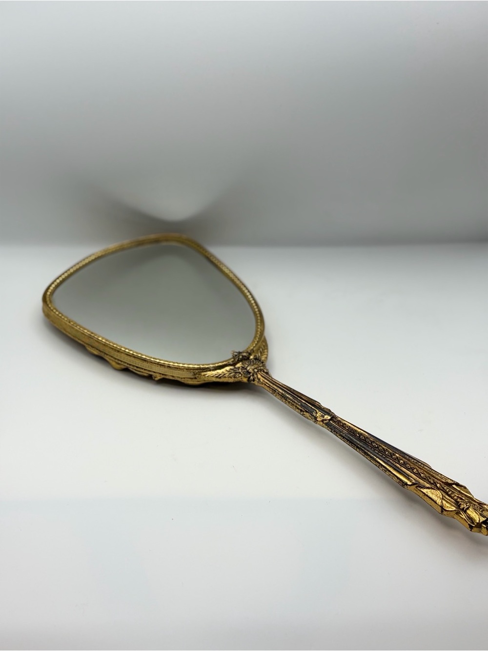 Vintage Ornate Brass Hand Held Mirror, Hollywood Regency style